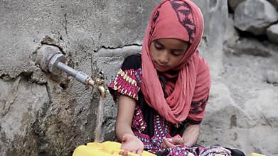 His child is sad because of the water crisis in Yemen