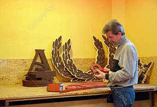 Sign Painter Working