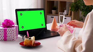 woman with laptop having virtual birthday party