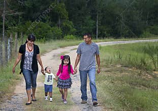 Hispanic Family - Walking in Rain