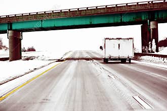 Snowmobile Trailer Going Under Bridge