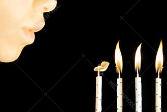 Blowing birthday candles