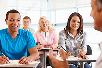 Tutor with class of students