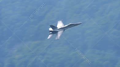 Closeup of a military fighter jet plane in slow motion