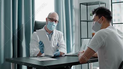 Professional therapist shows patient examination results