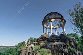 A view of The Temple of Love, an extended rock garden topped with a round temple. Located at