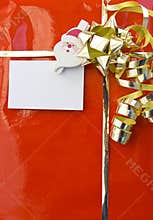 Red christmas gift with empty card