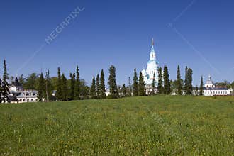 View of the Valaam Monastery Cathedral in summer from the field