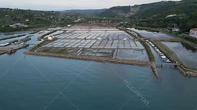 Piranske Soline in Strunjan at sunset aerial towards salt pans