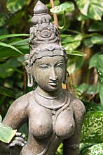 Idol of hindu deity in greenery