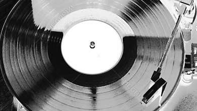 A stylized image of a working gramophone.