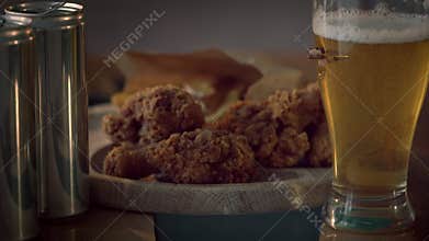 Beer and snacks on the table.