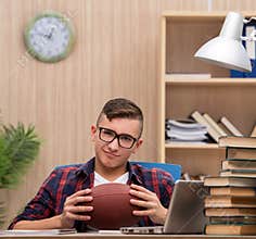 Young student preferring playing baseball to studying