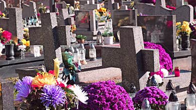 Cemetery with Colorful Flowers and Tombstones