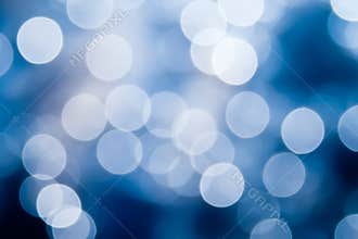 Abstract blue and white circular bokeh background