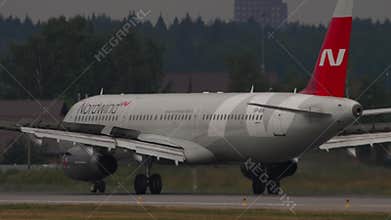 Airbus A321 of Nordwind Airlines braking after landing