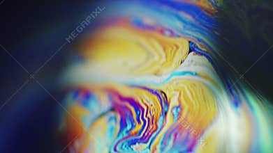 Ink spill paint blend color fluid wave mix on dark