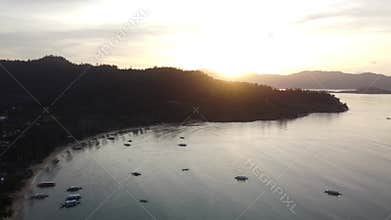 Philippine Paradise: Aerial Drone Views of Stunning Sunsets, Sunrises, and Tropical Beaches with Palm Trees