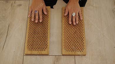 Female hands Sadhu board