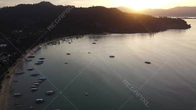 Philippine Paradise: Aerial Drone Views of Stunning Sunsets, Sunrises, and Tropical Beaches with Palm Trees