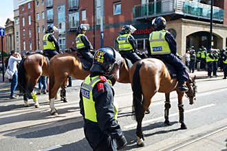 Mounted police cordon the streets