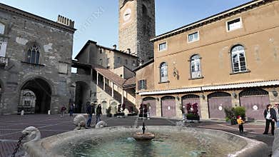 Bergamo, Italy. The Old town. Landscape at the clock tower and the fountain