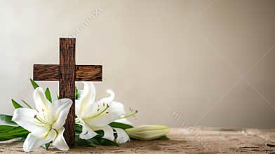 a wooden cross and white lily flowers on a table against a beige background, with space for copy, symbolizing an Easter
