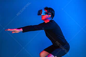 Smart sportman player wearing VR stretching whole body posing. Contrivance.