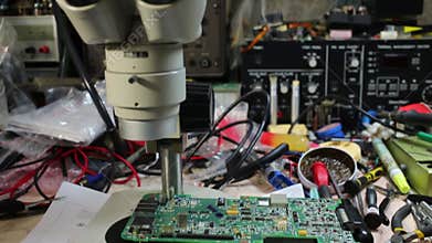 Green motherboard, microscope among many tools for