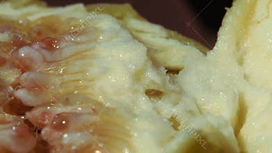 Figs in the hands of a man broken into two parts against the background of the sea. Live a healthy life. Be H3althy