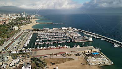 Aerial footage of a beautiful beach with buildings.