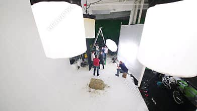 Videographer, singers and assistants work at