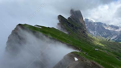 Panoramic view of the peak of Seceda mountain with fog, Alto Adige