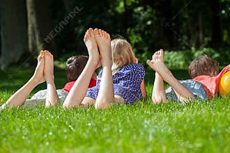Kids relaxing in park