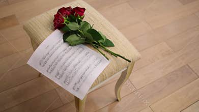 Beautiful flowers of red rose and paper with a