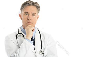 Portrait Of Thoughtful Male Doctor With Hand On Chin