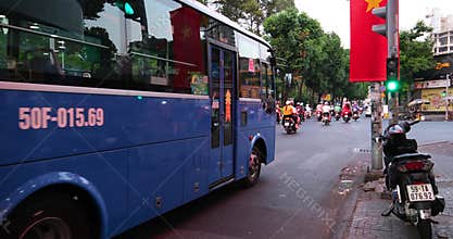 Vietnam Ho Chi Minh City 06.03.2024 Saigon evening people People walk around the city, sit in cafes, ride motorcycles
