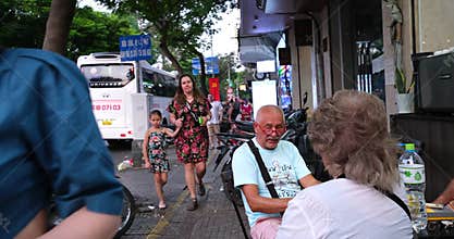 Vietnam Ho Chi Minh City 06.03.2024 Saigon evening people People walk around the city, sit in cafes, ride motorcycles