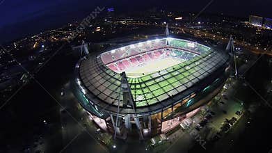 People sit on tribunes of Lokomotiv football