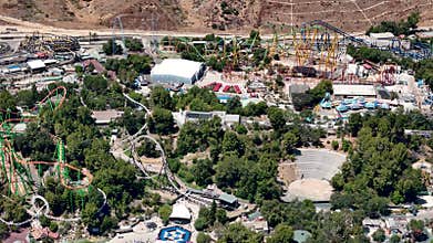 Vivid Aerial Close-Up of Six Flags Magic Mountain: Intense Roller Coasters and Lush Landscapes