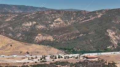 Elevated View of Road and Reservoir Near Pyramid Lake, California: Harmony of Nature and Infrastructure