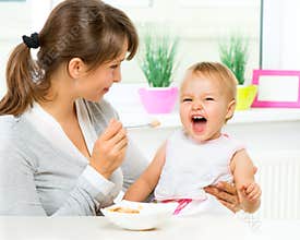 Mother Feeding Her Baby