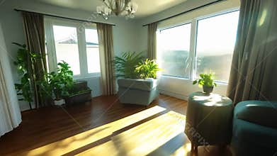 A camera pans through a sunlit living room with large windows, showcasing the room\'s elegant design