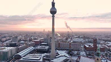 City of Berlin, Germany from above. Aerial winter cityscape view at sunrise or sunset,