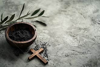 Religion, faith, liturgy, Ash Wednesday, Lent background. Brown wooden cross, ceremonial ash bowl and olive branch on