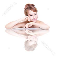 Beauty woman face with mirror reflection