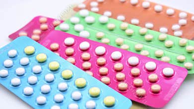 Colorful strips of oral contraceptive pill.