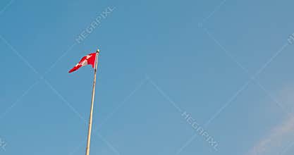 Canada national flag is waving in wind. Bottom view to flag of Canada on flagpole is flapping in wind. Stunning view of