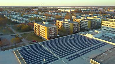 Producing of sustainable energy. Electric photovoltaic solar panels installed on shopping mall building rooftop for