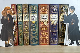 complete collection paper books by JK Rowling about Harry Potter, appealing to book lovers, especially fans children\'s